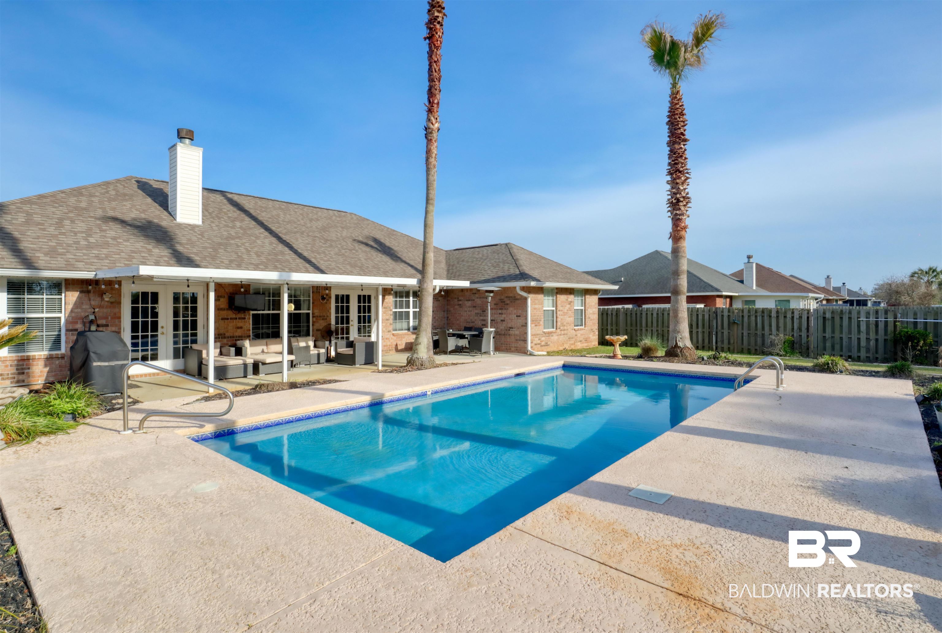 12893 Hunters Chase Foley, AL 36535 - Photo 40 of 42 View of pool featuring fence, area for grilling, a patio, a fenced in pool, and french doors