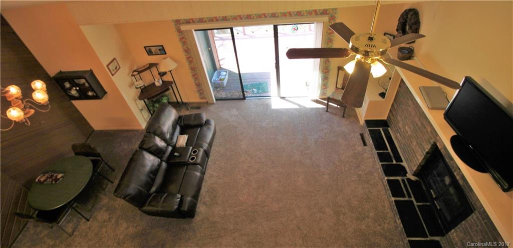 303 Riddle Cove Road, Unit 330 Maggie Valley, NC 28751 - Photo 12 of 24 a view of a room with gym equipment