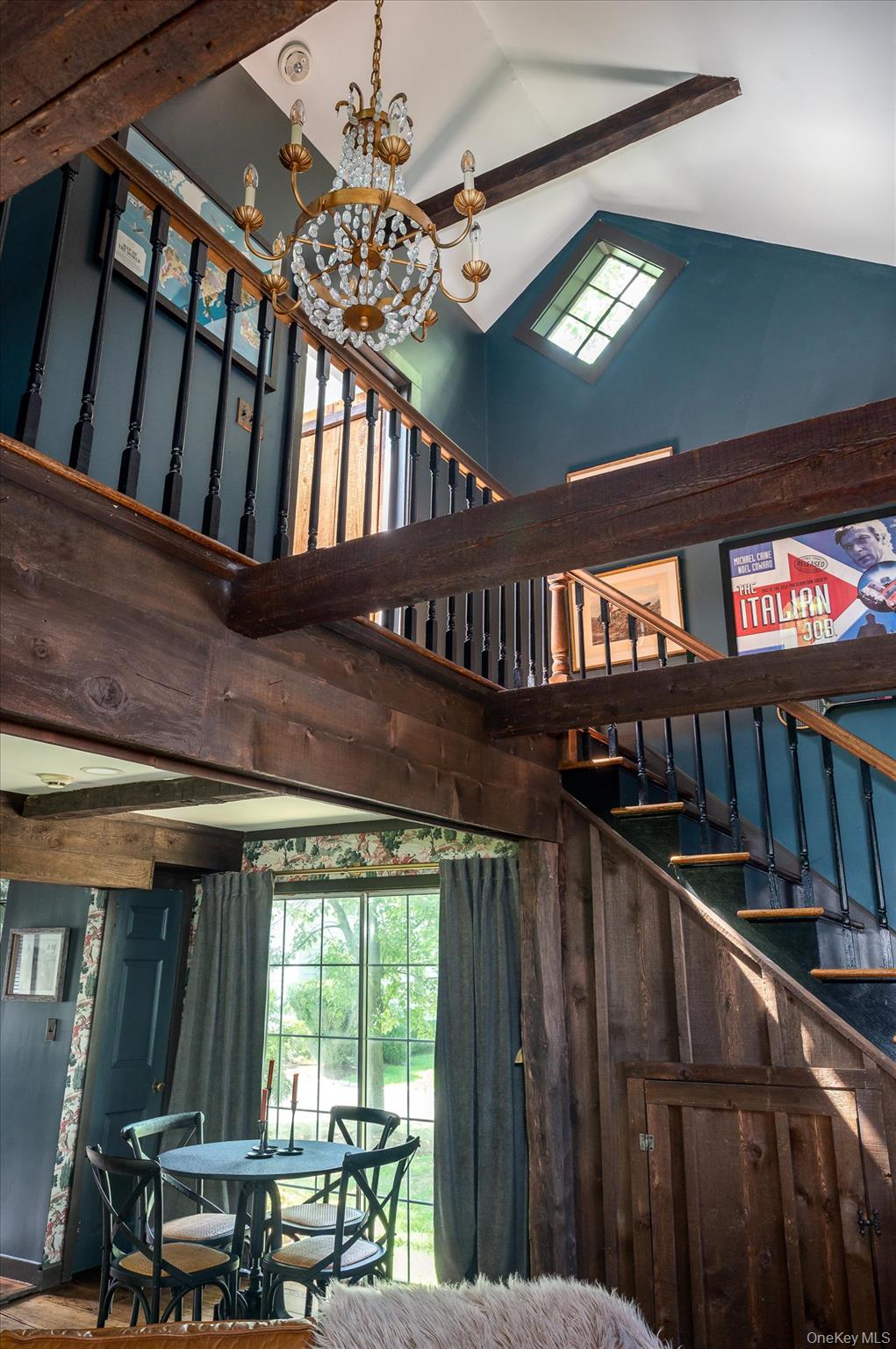 459 Old Post Road Bedford, NY 10506 - Photo 20 of 23 Stairs featuring high vaulted ceiling, a chandelier, and beamed ceiling