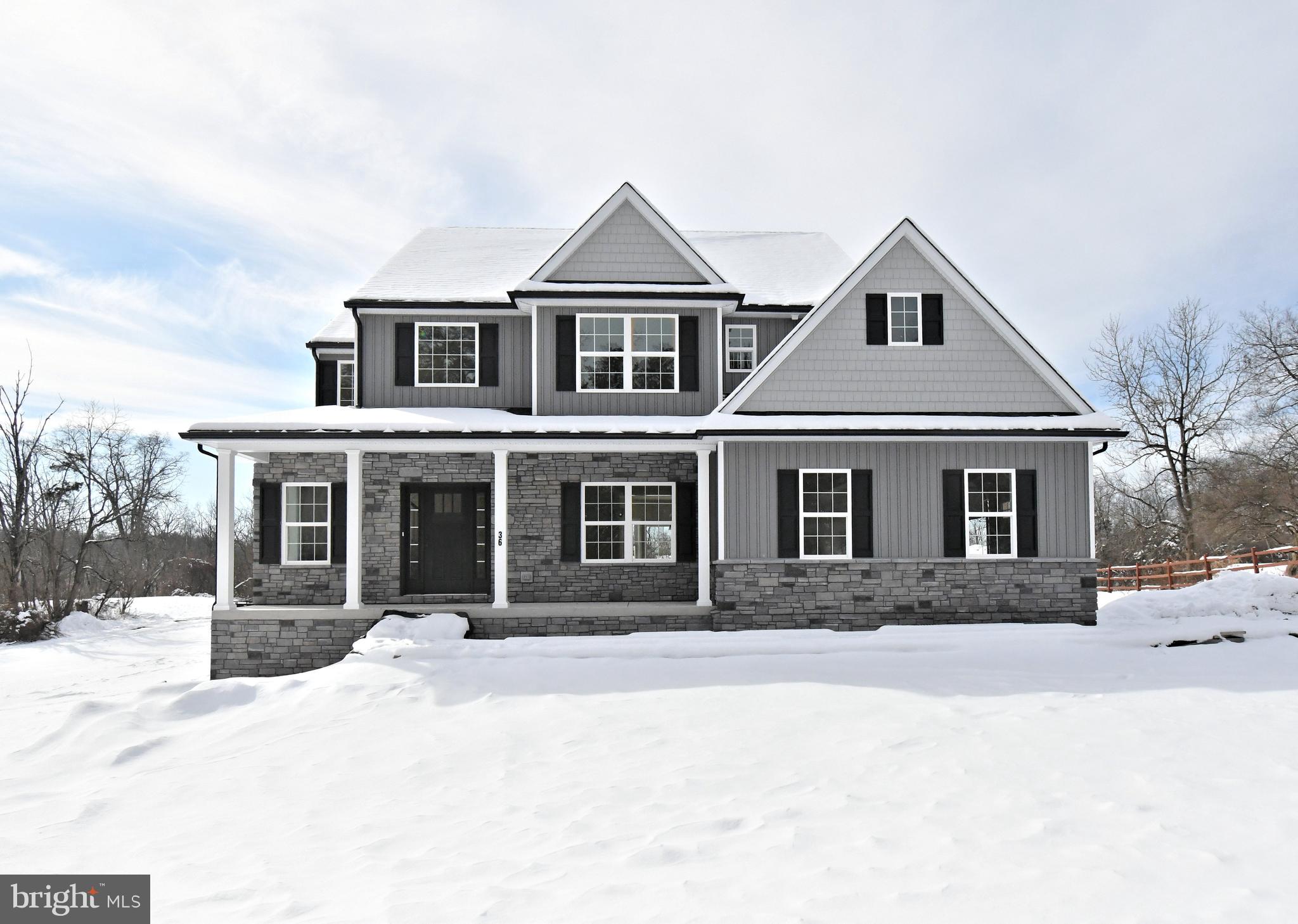 36 Hockle Road Schwenksville, PA 19473 - Photo 1 of 62 a front view of a house with a yard
