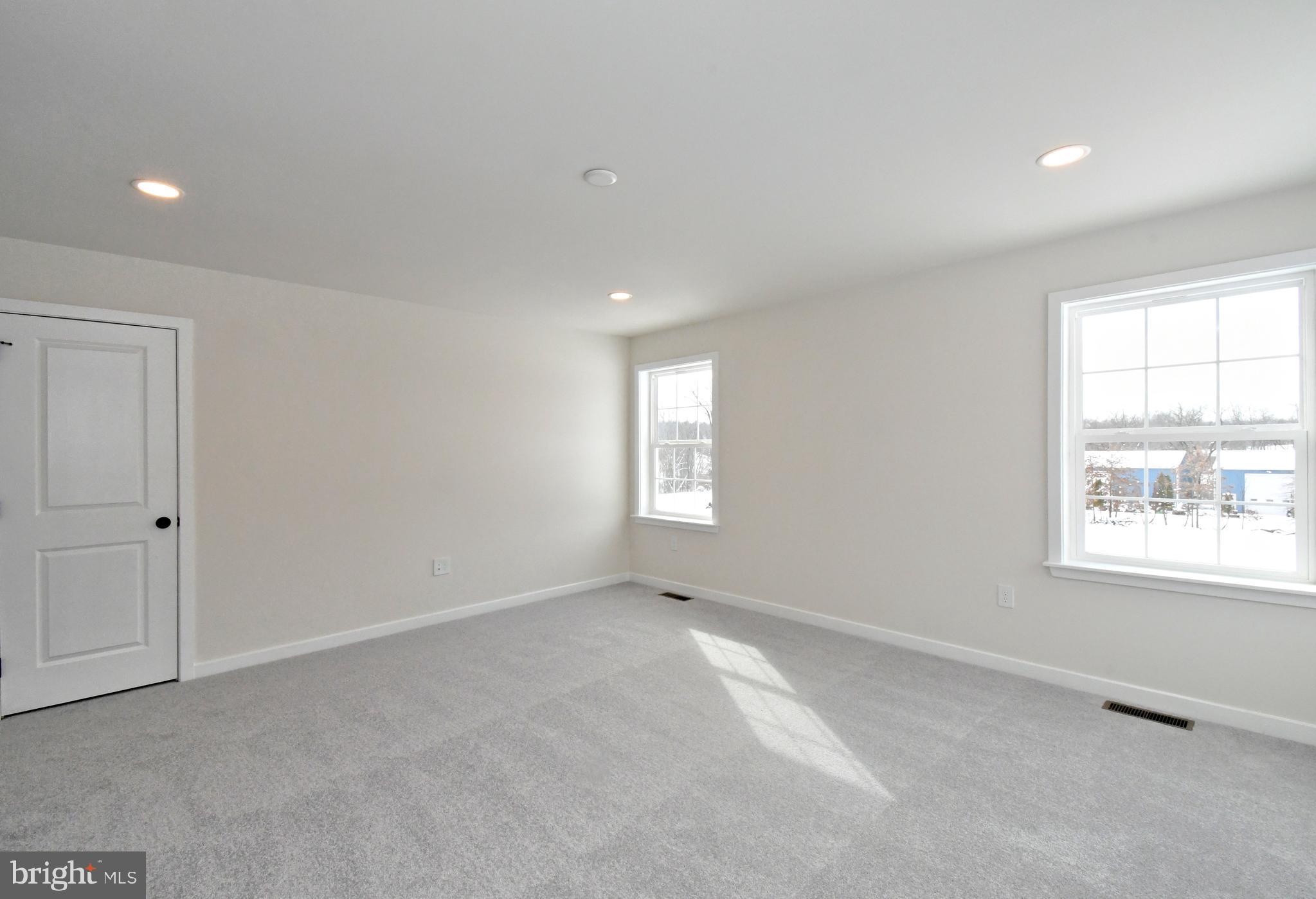 36 Hockle Road Schwenksville, PA 19473 - Photo 31 of 62 a view of an empty room with a window