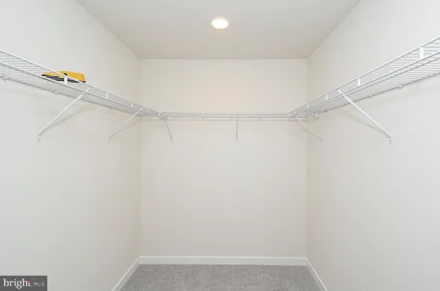 a bathroom with a sink double vanity and a mirror