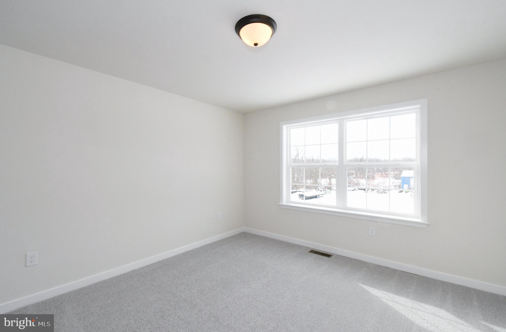 36 Hockle Road Schwenksville, PA 19473 - Photo 41 of 62 an empty room with a window