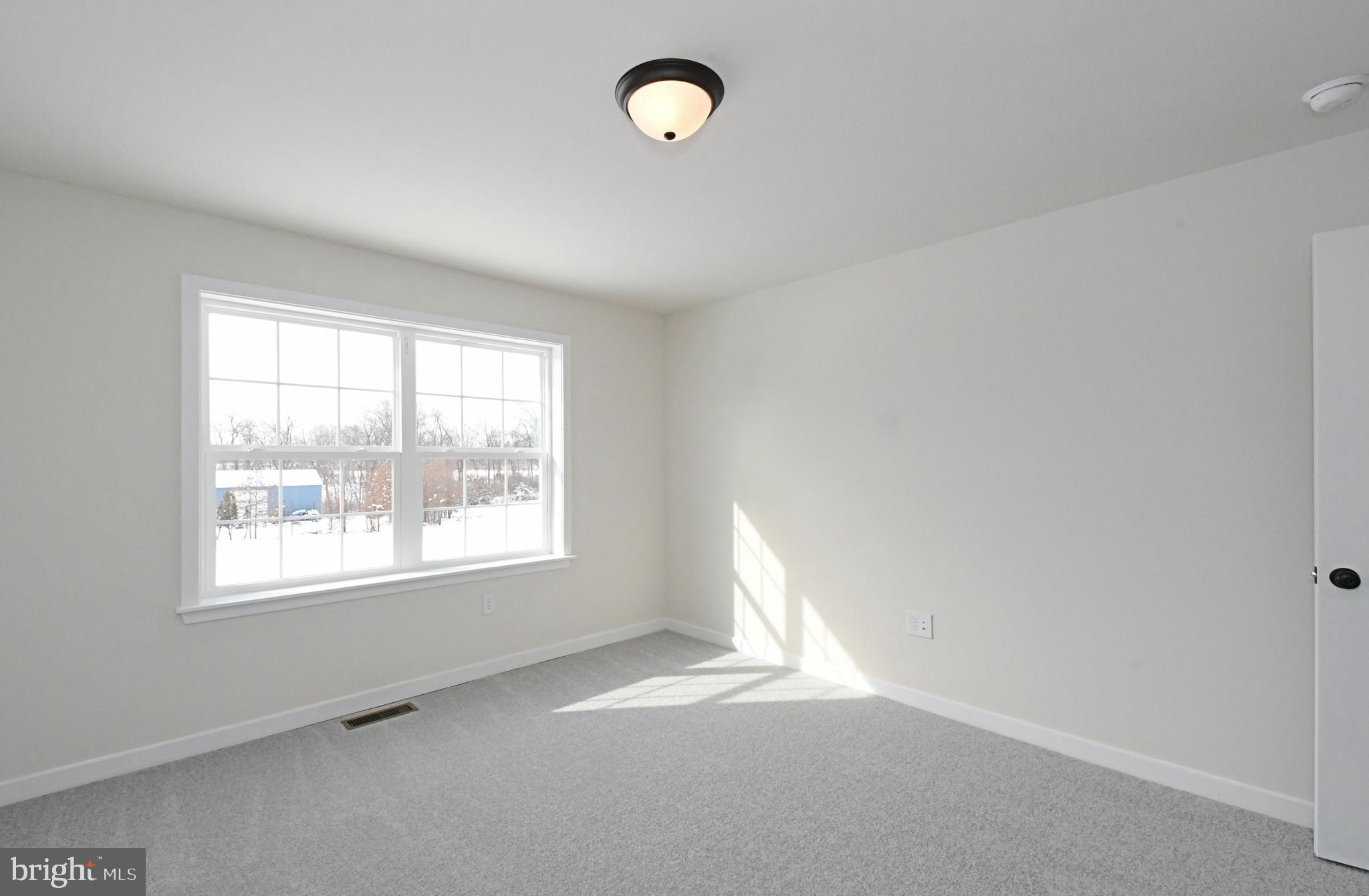 36 Hockle Road Schwenksville, PA 19473 - Photo 42 of 62 an empty room with a empty space and windows