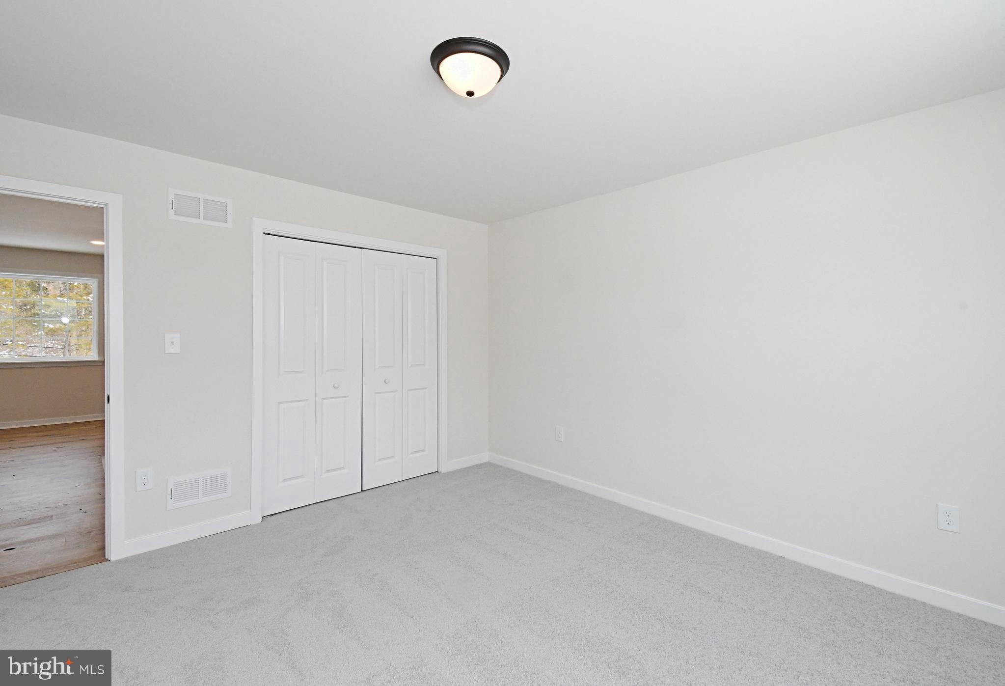 36 Hockle Road Schwenksville, PA 19473 - Photo 44 of 62 an empty room with windows