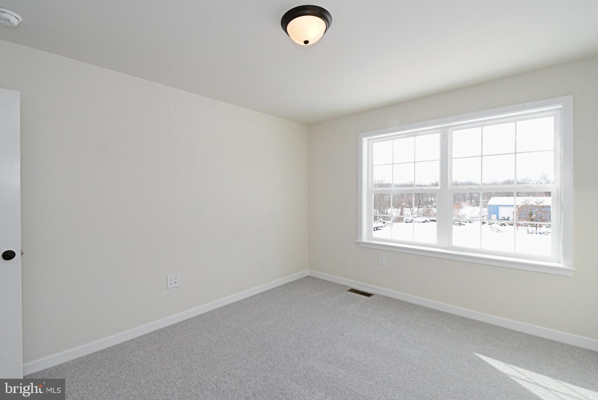 36 Hockle Road Schwenksville, PA 19473 - Photo 46 of 62 an empty room with a window