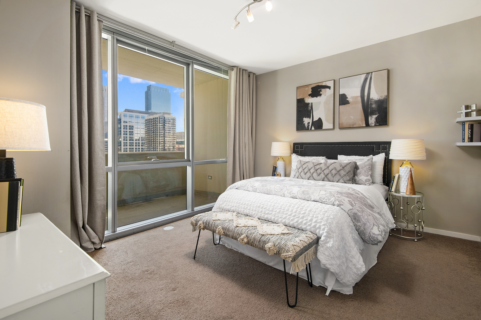 123 South Green Street, Unit 903B Chicago, IL 60607 - Photo 11 of 22 a bedroom with a bed and a window