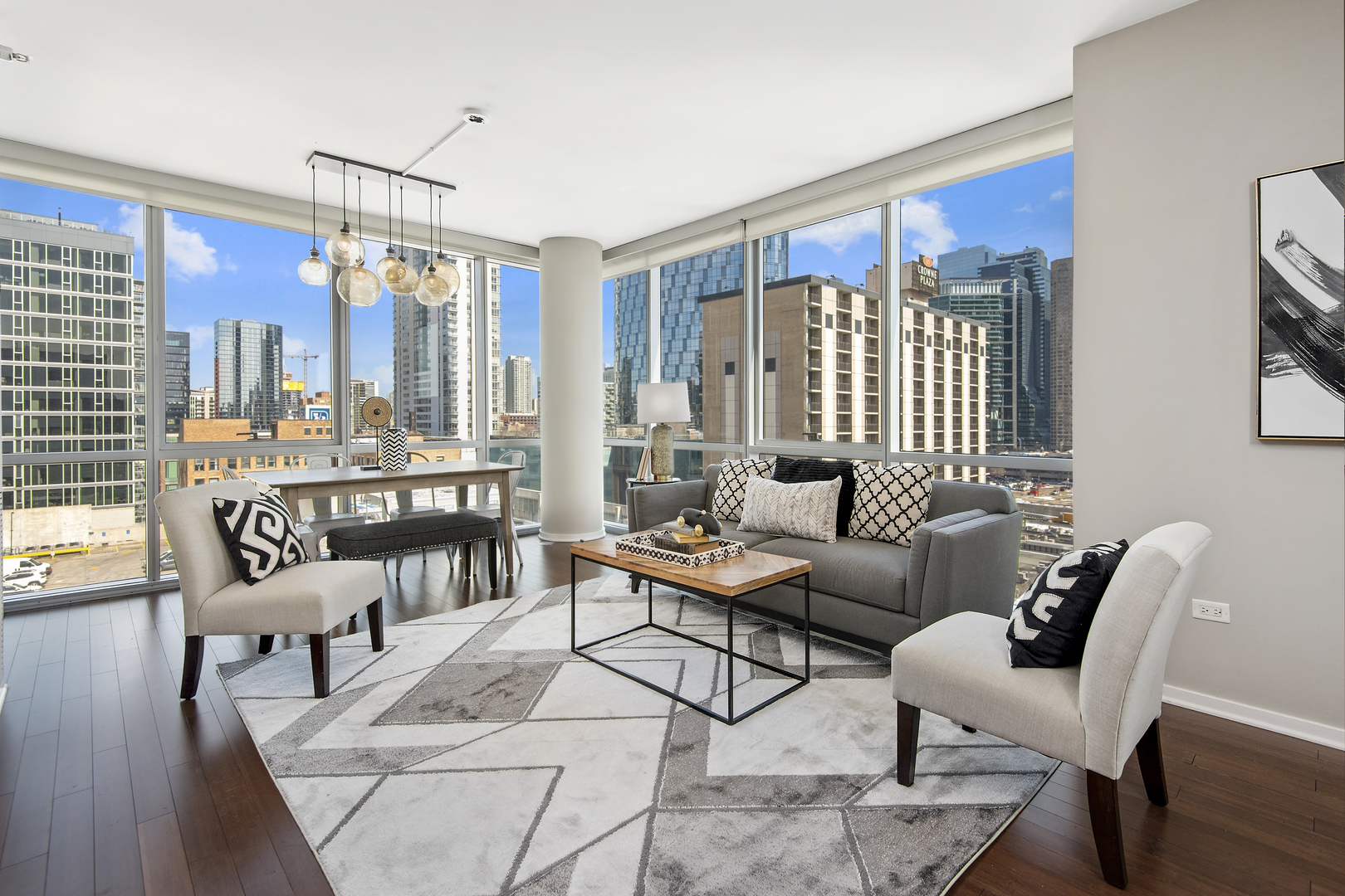 123 South Green Street, Unit 903B Chicago, IL 60607 - Photo 2 of 22 a living room with furniture and a large window