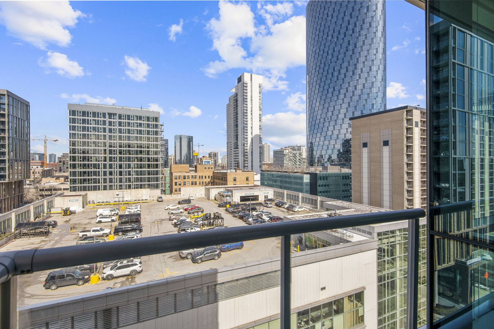 123 South Green Street, Unit 903B Chicago, IL 60607 - Photo 9 of 22 a view of a city from a kitchen