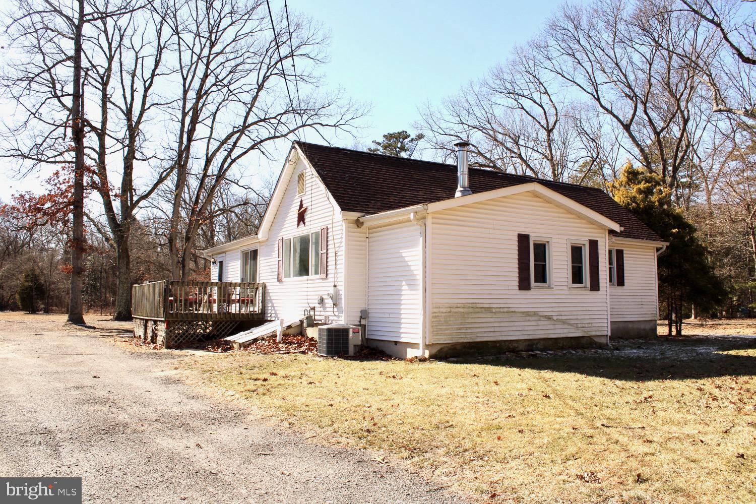 73 Hawkin Road Tabernacle, NJ 08088 - Photo 1 of 29 a view of a house with snow on the road