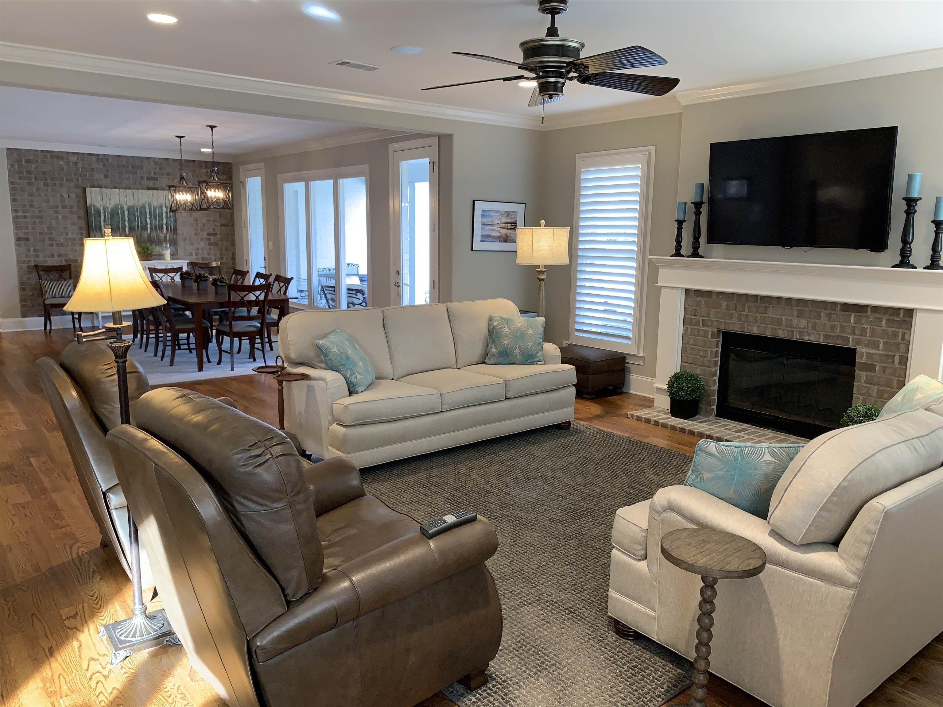 56 South Fernway Road Memphis, TN 38117 - Photo 8 of 25 a living room with furniture fireplace and a flat screen tv