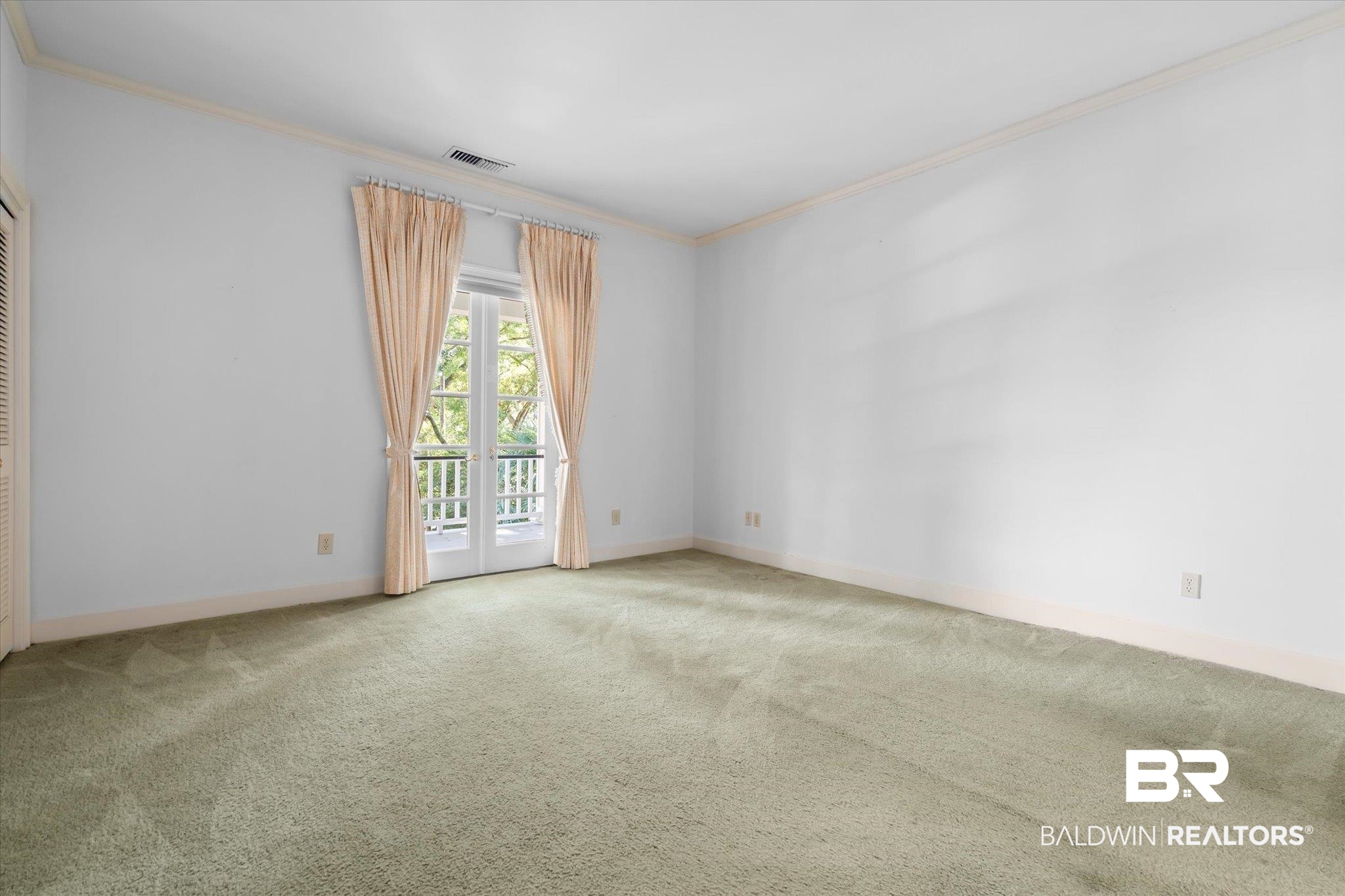54 Turnin Lane Mobile, AL 36608 - Photo 23 of 35 Empty room featuring crown molding and carpet