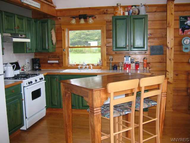 640 Yankee Hill Road Ischua, NY 14743 - Photo 3 of 16 Kitchen. Efficient kitchen with a separate dining