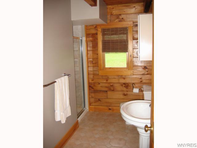 640 Yankee Hill Road Ischua, NY 14743 - Photo 7 of 16 Bathroom. Downstairs full bathroom with walk in sh