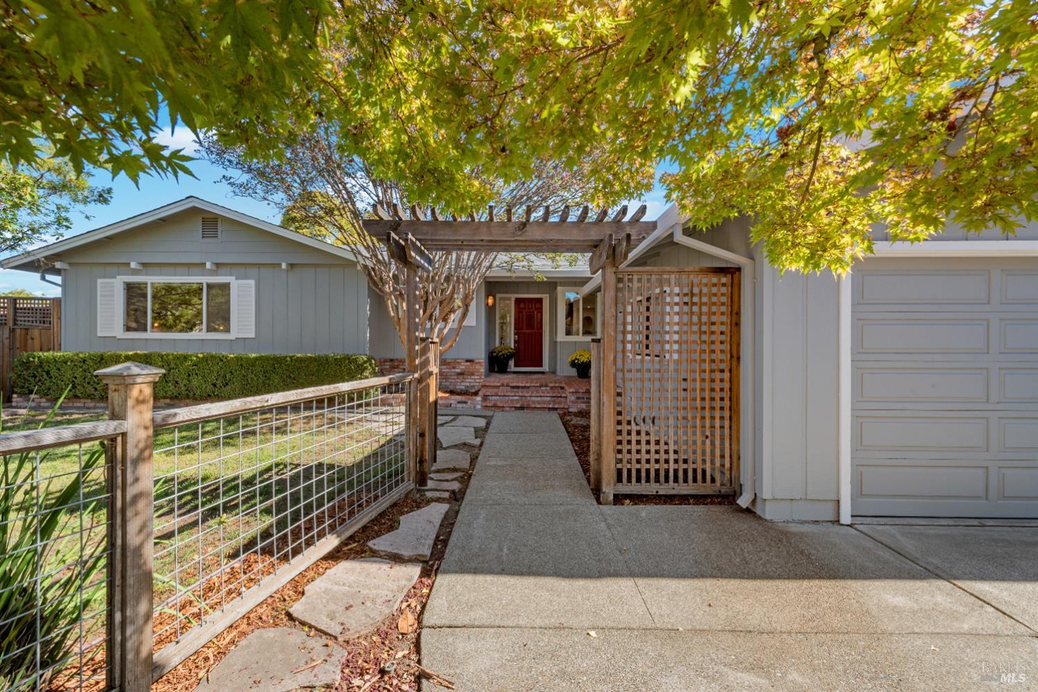 3996 Young Avenue Napa, CA 94558 - Photo 1 of 48 a view of a house with a large window and wooden fence