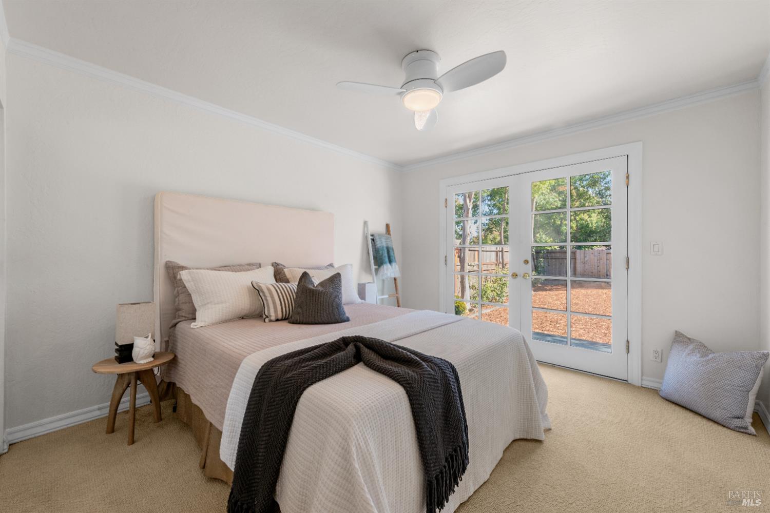 3996 Young Avenue Napa, CA 94558 - Photo 21 of 48 a bedroom with a large bed and a large window