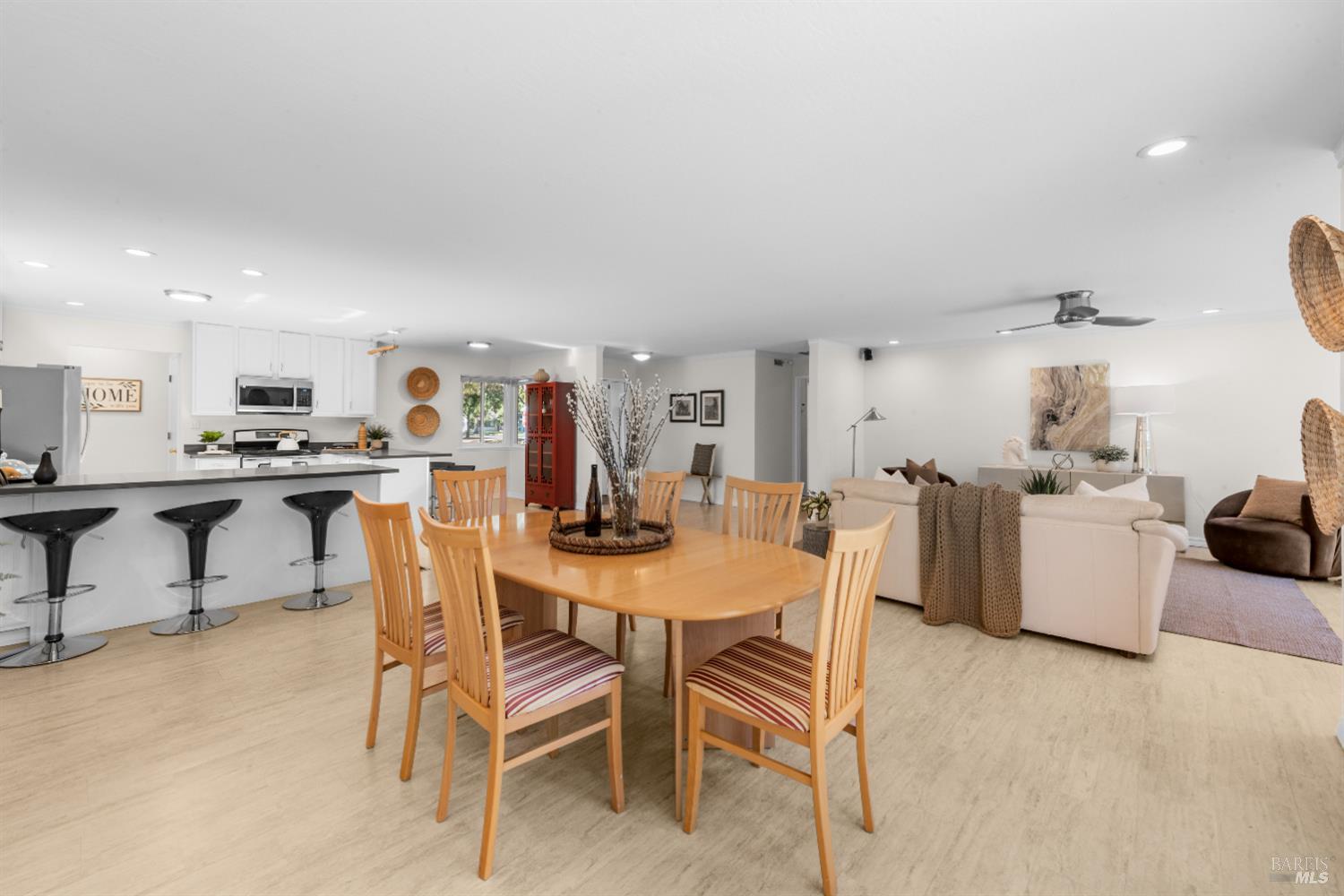 3996 Young Avenue Napa, CA 94558 - Photo 37 of 48 a view of a dining room with furniture and a kitchen