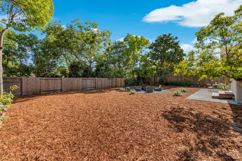 a house with trees in front of it