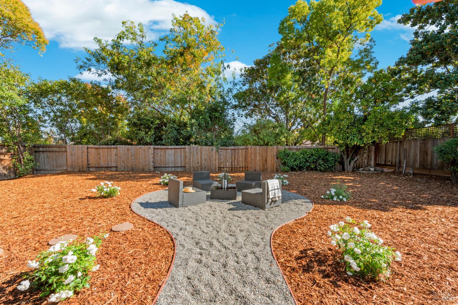 3996 Young Avenue Napa, CA 94558 - Photo 7 of 48 a backyard of a house with table and chairs