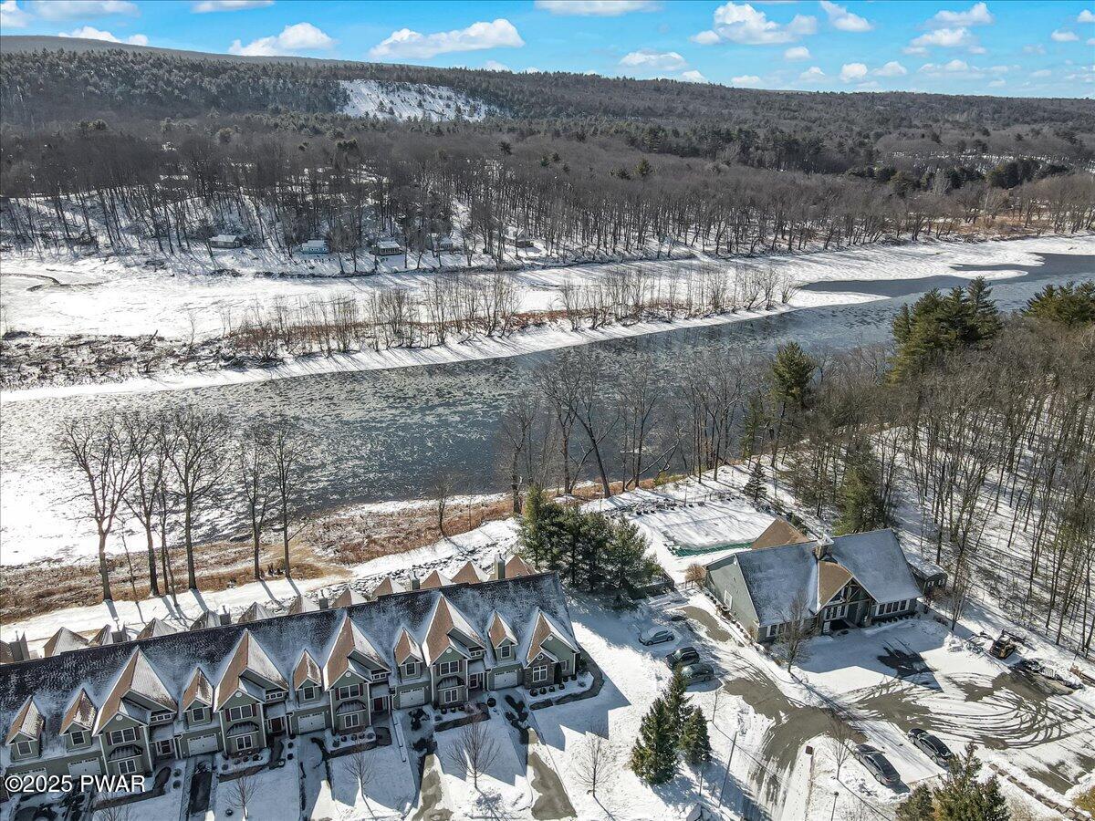 1010 MacIntosh Way Matamoras, PA 18336 - Photo 54 of 60 a view of a lake from a yard