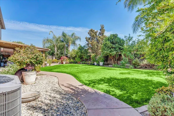 a house view with a garden space