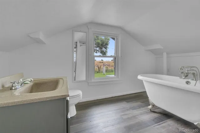 a bathroom with a sink and a toilet