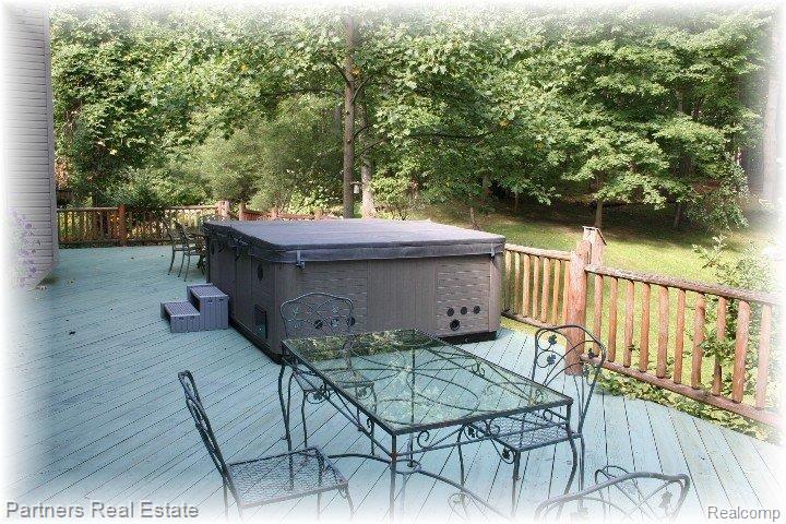 2541 Spruce Ridge Howell, MI 48855 - Photo 19 of 24 Deck with HotTub_ViewNorth
