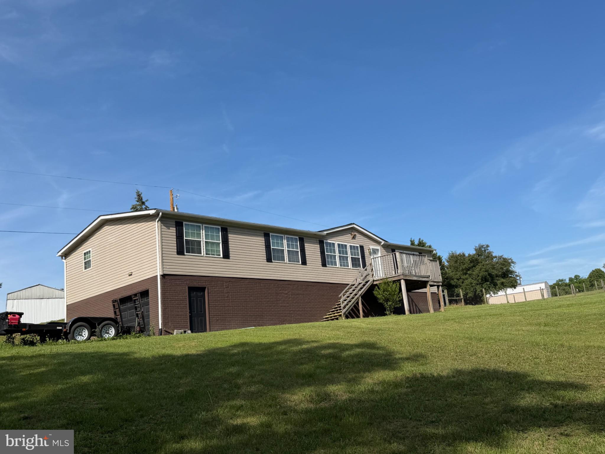1898 Sawmill Road Hedgesville, WV 25427 - Photo 1 of 6 Charming hillside home with open skies.