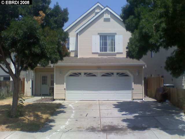 2068 Springbrook Court Oakley, CA 94561 - Photo 1 of 1 a front view of a house with garage