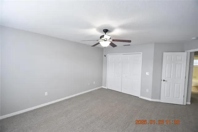 a bath room with a toilet a sink and a bath tub