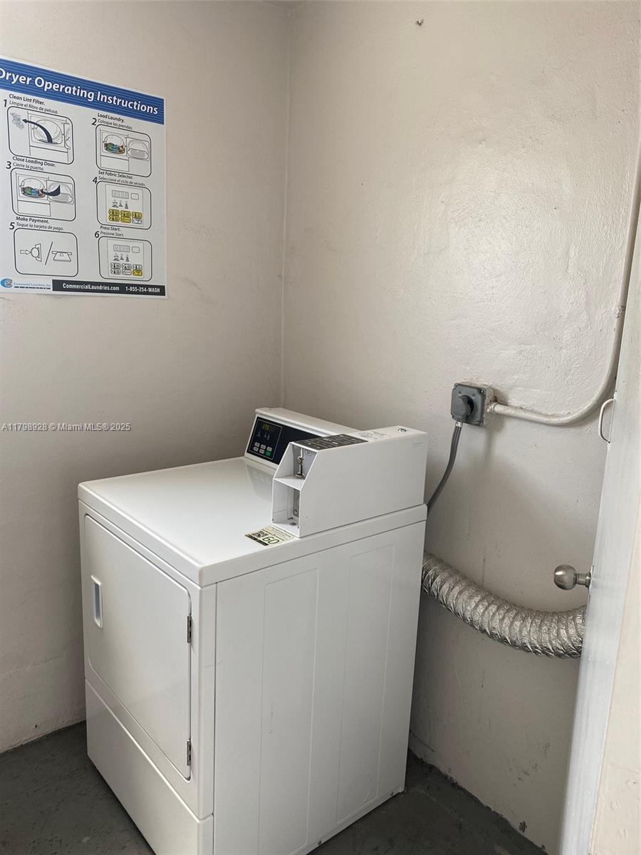 1400 Southwest 27th Avenue, Unit 202 Miami, FL 33145 - Photo 29 of 34 a utility room with dryer and washer