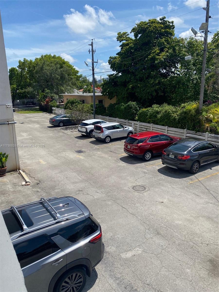 1400 Southwest 27th Avenue, Unit 202 Miami, FL 33145 - Photo 34 of 34 a view of street with parked cars