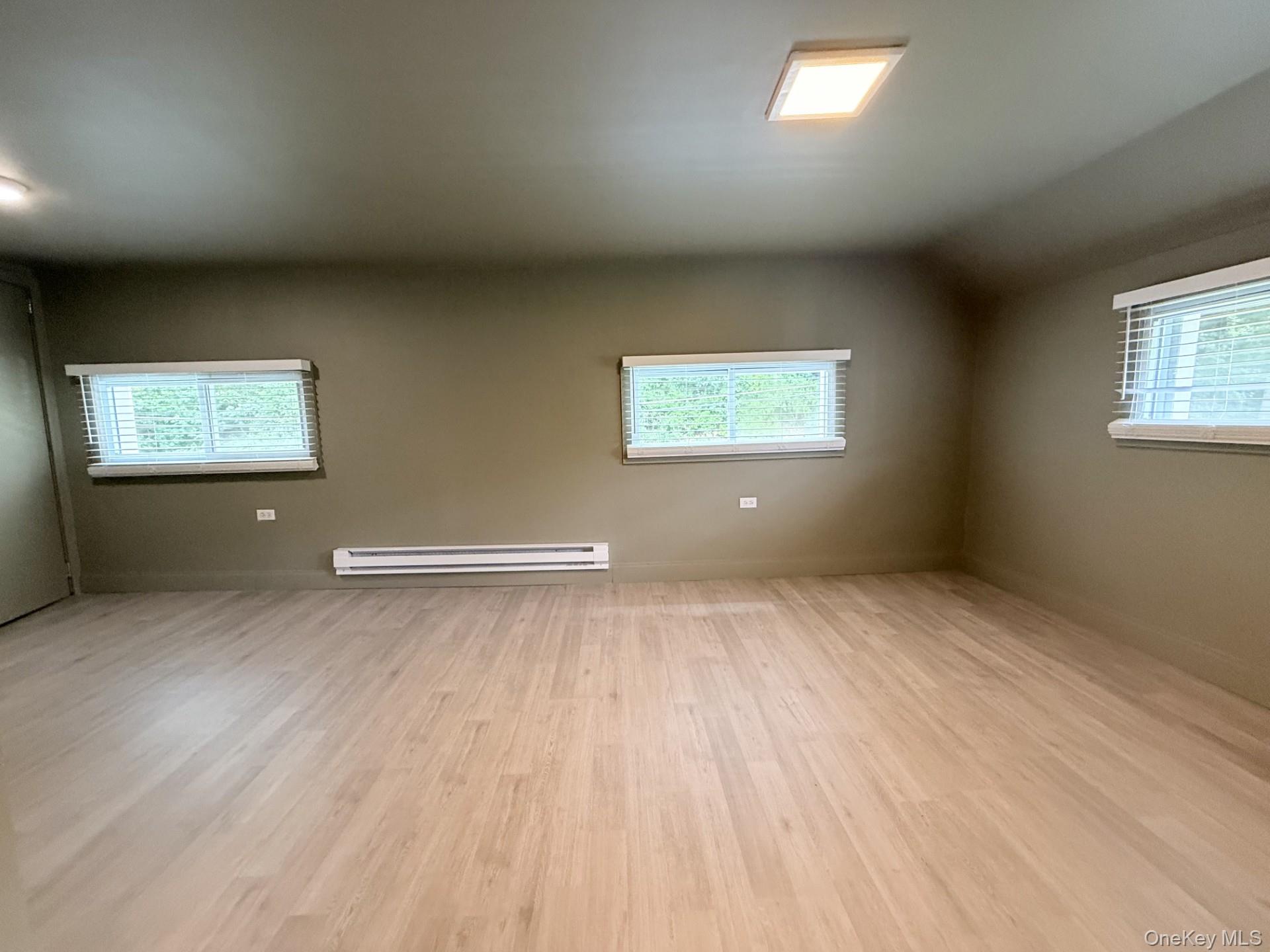4 Lower Trinity Pass Road Pound Ridge, NY 10576 - Photo 23 of 29 an empty room with windows
