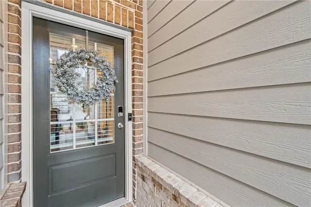 a view of a door and a window