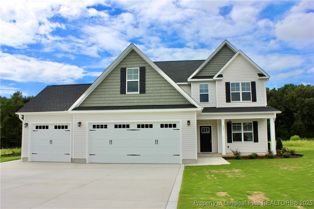 112 Surles Road Benson, NC 27504 - Photo 1 of 40 front view of a house with a yard