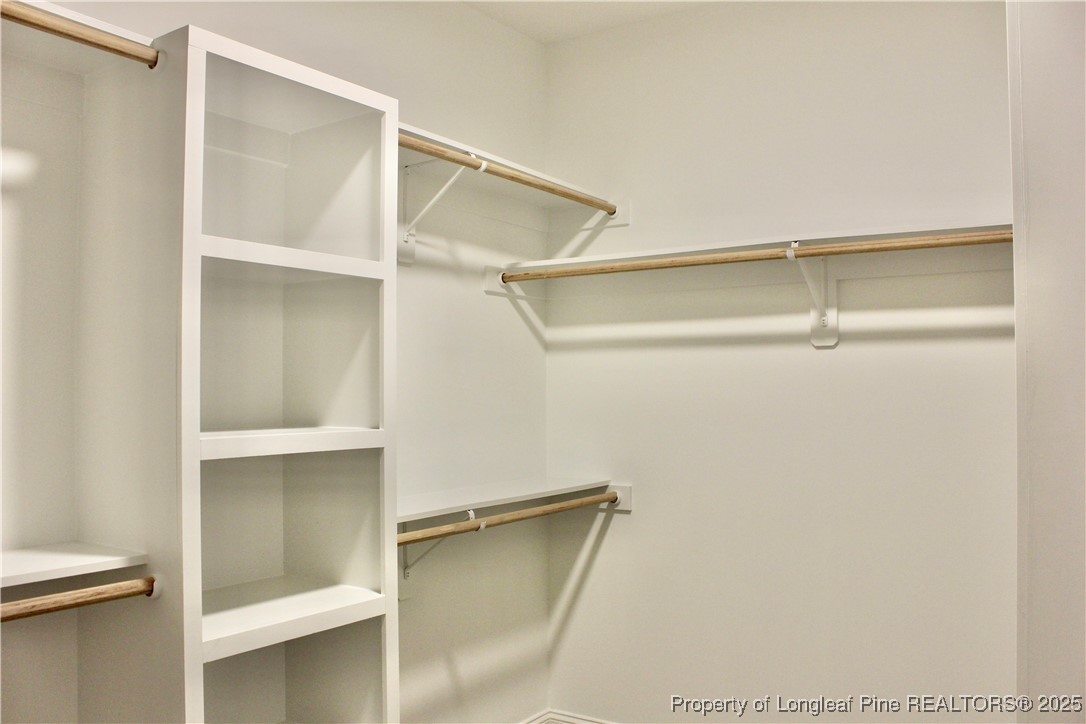 112 Surles Road Benson, NC 27504 - Photo 19 of 40 a view of an empty walk in closet