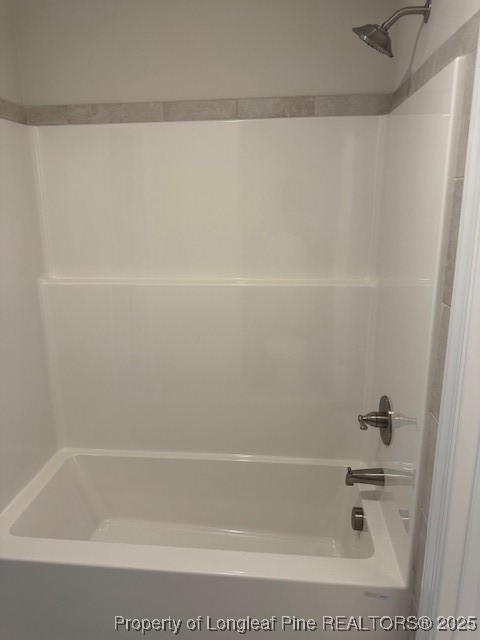 112 Surles Road Benson, NC 27504 - Photo 29 of 40 a close up of a bathtub in a bathroom