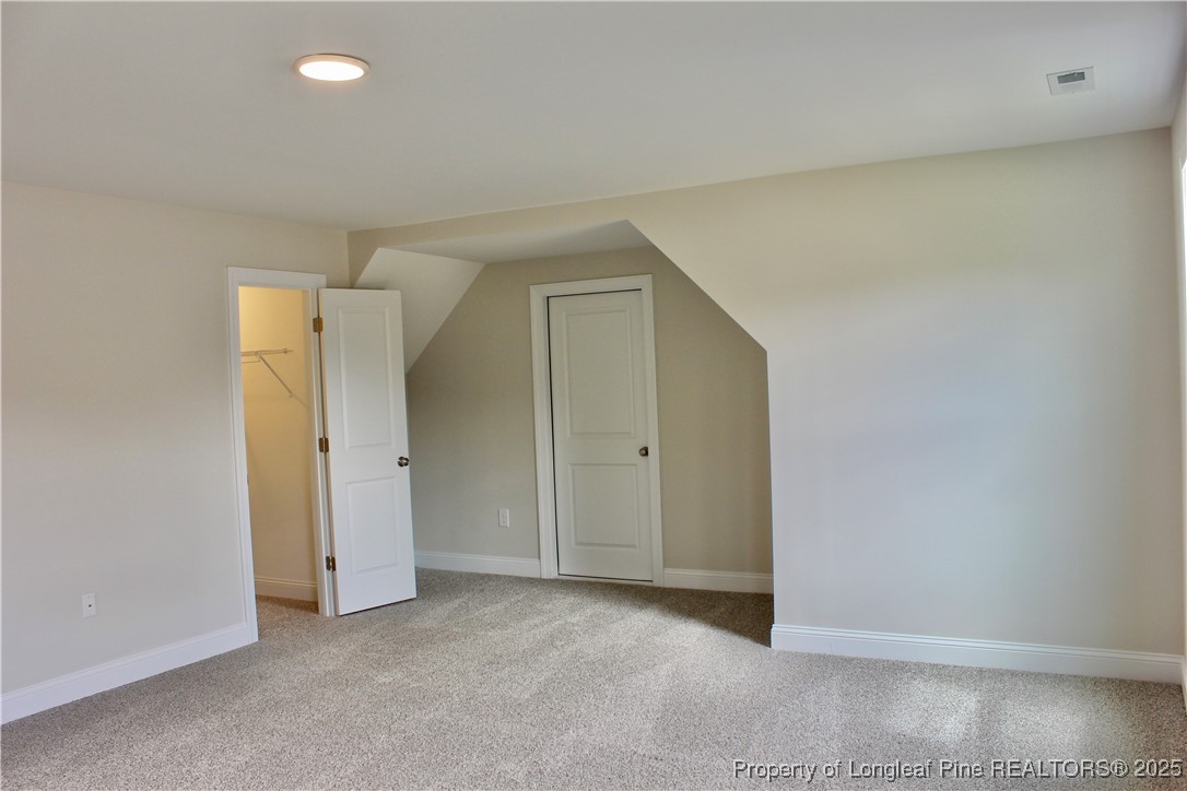 112 Surles Road Benson, NC 27504 - Photo 34 of 40 a view of an empty room