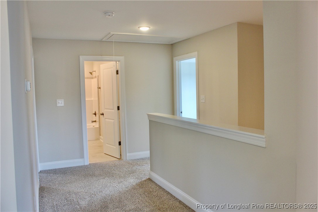 112 Surles Road Benson, NC 27504 - Photo 35 of 40 an empty room with windows and closet