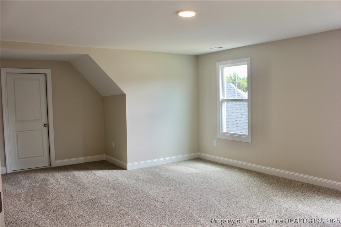 112 Surles Road Benson, NC 27504 - Photo 36 of 40 an empty room with windows