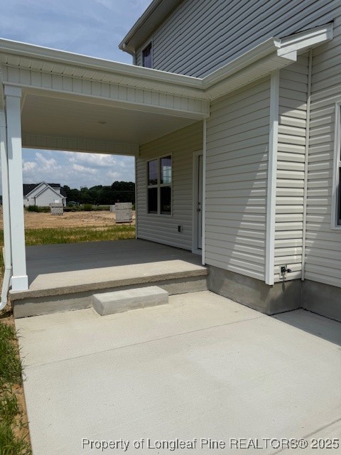 112 Surles Road Benson, NC 27504 - Photo 38 of 40 a view of a house with a balcony
