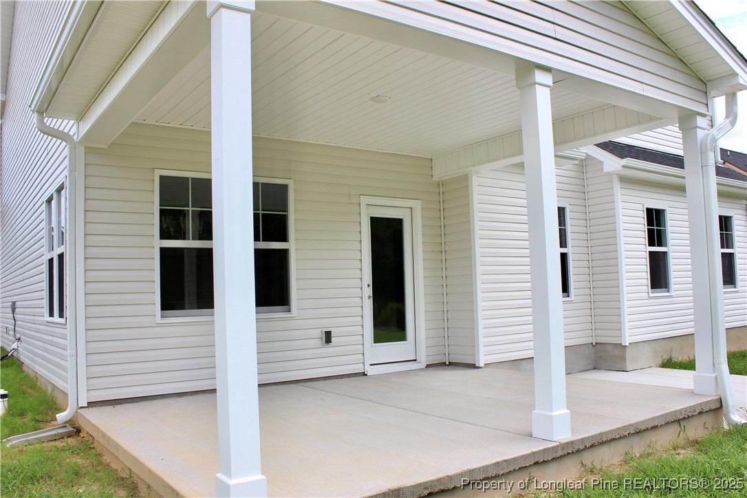 112 Surles Road Benson, NC 27504 - Photo 39 of 40 a view of a entryway front of house