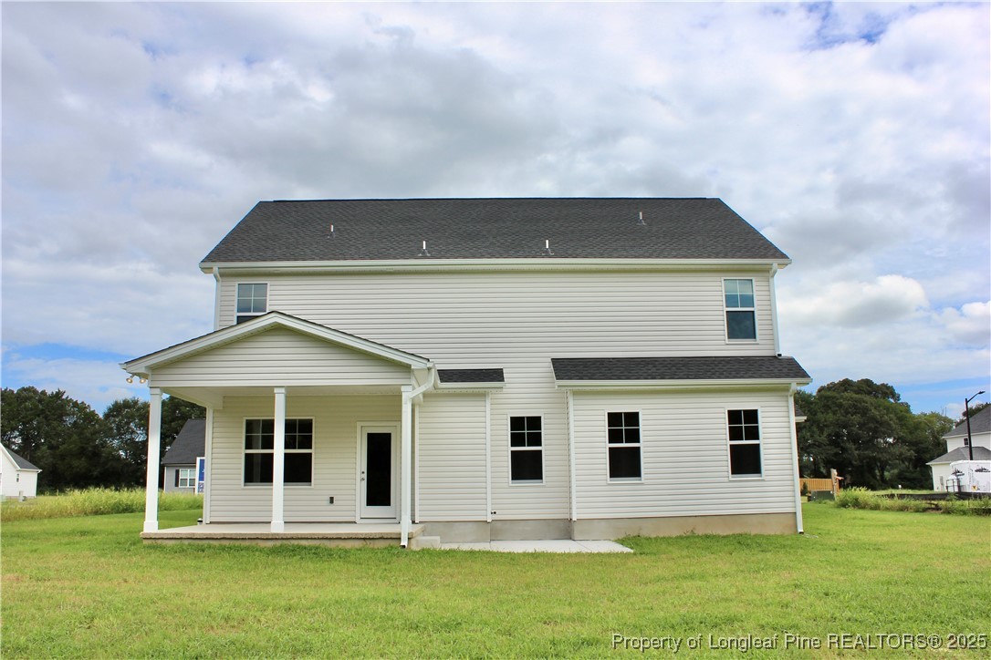 112 Surles Road Benson, NC 27504 - Photo 40 of 40 a front view of a house with a yard