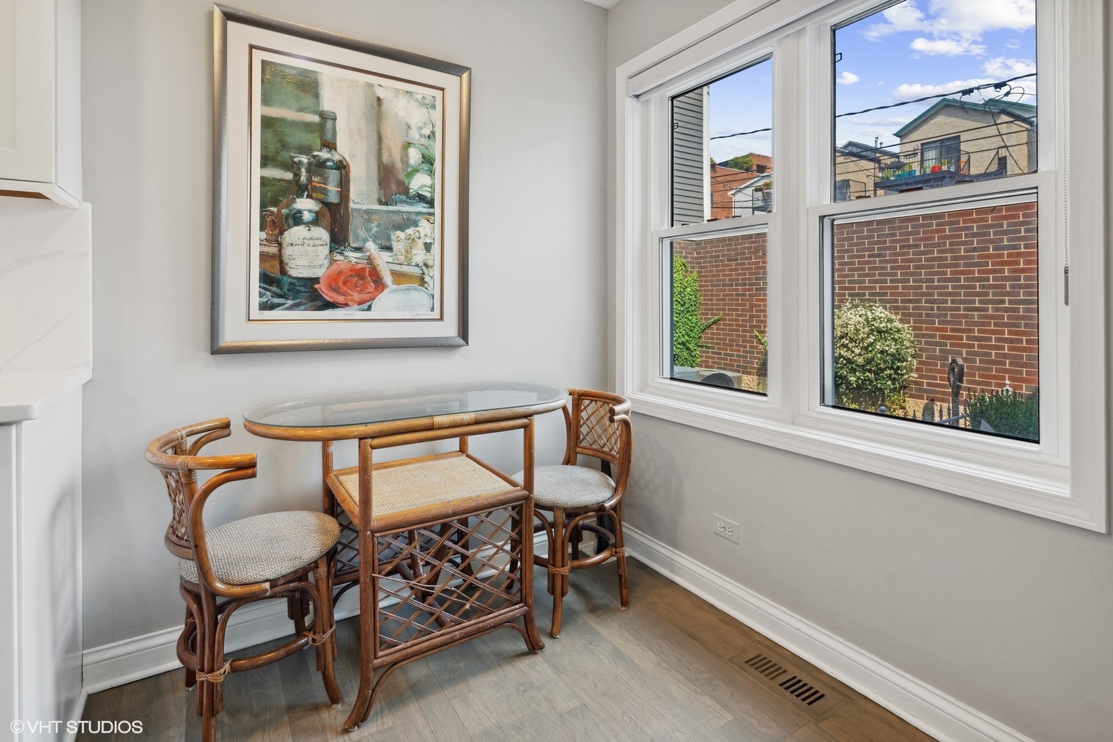 3305 North Racine Avenue, Unit E Chicago, IL 60657 - Photo 12 of 30 a view of a room that has a window and a chair