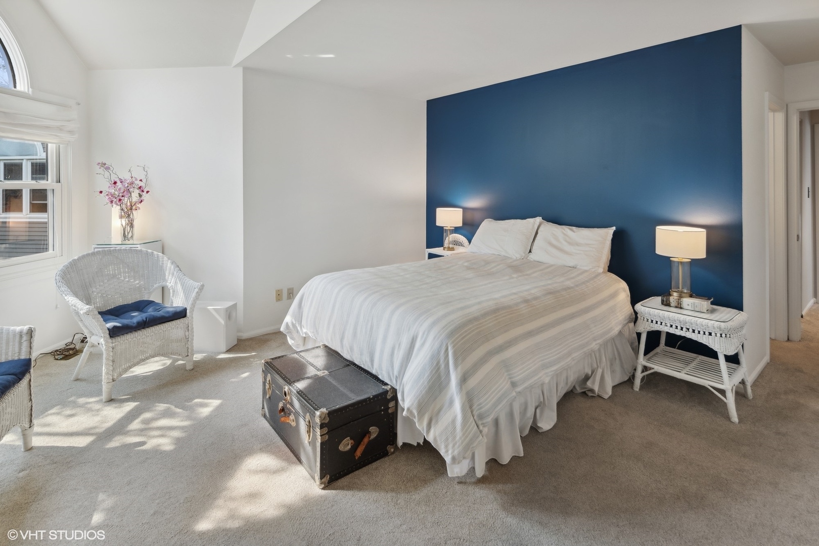 3305 North Racine Avenue, Unit E Chicago, IL 60657 - Photo 14 of 30 a bedroom with a bed and a chair