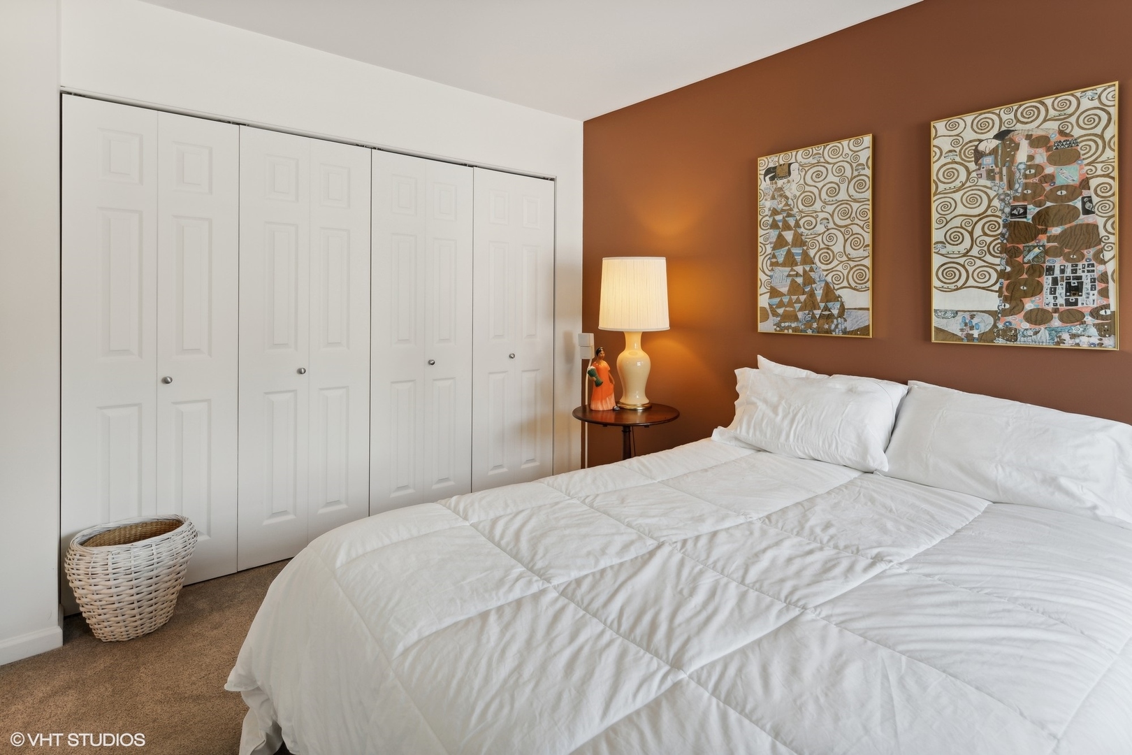 3305 North Racine Avenue, Unit E Chicago, IL 60657 - Photo 20 of 30 a bedroom with a bed and a painting on the wall