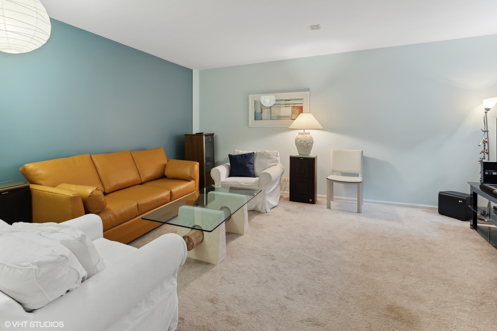 3305 North Racine Avenue, Unit E Chicago, IL 60657 - Photo 22 of 30 a living room with furniture and a couch