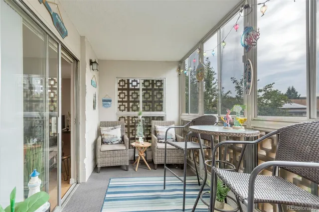 a bed room with a bed and a chandelier