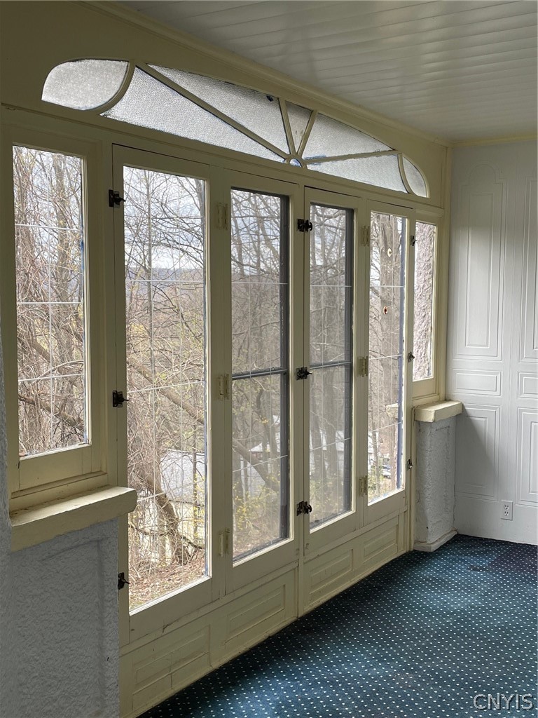 321 Rockwell Road Onondaga, NY 13120 - Photo 18 of 45 Enclosed porch overlooking yard