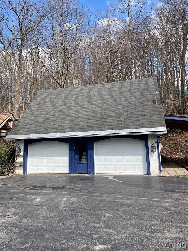 321 Rockwell Road Onondaga, NY 13120 - Photo 2 of 45 Two car garage with upstairs storage
